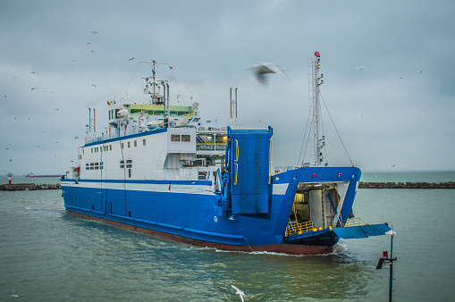 Crimea, kerch ferry swimming with cars and tourists on rainy weather