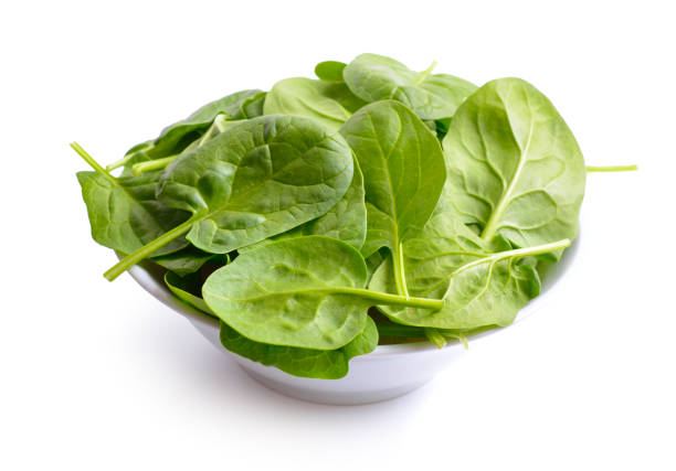 istock Fresh bunch of spinach in the bowl. 1210601324