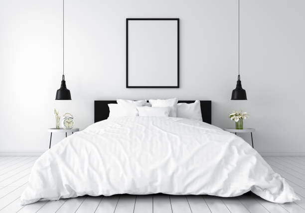 istock Blank photo frame for mockup in white bedroom, 3D rendering 1210601370