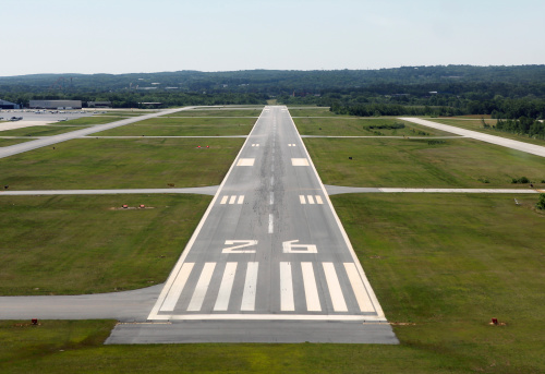 Runway approach at a rural airport in the eastern United States.