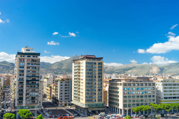 istock Aerial view of Palermo with mountains and clouds on background 1210604200