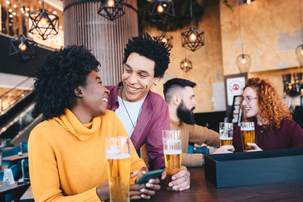 istock Couple spending their time in the bar discussing, talking and laughing. 1210604851