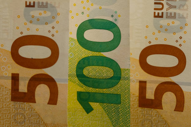 istock Three euro banknotes in two denominations only 1210609517