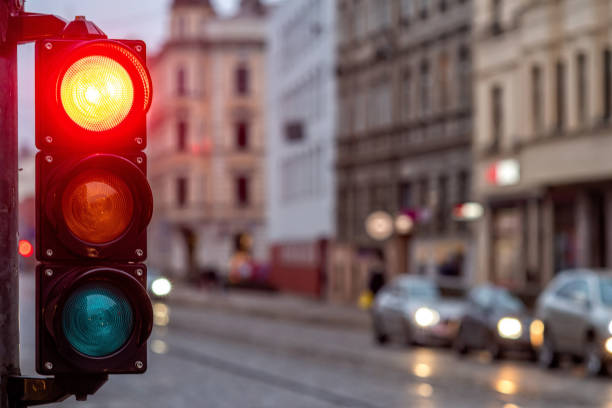 istock A city crossing with a semaphore. Red light in semaphore 1210612437