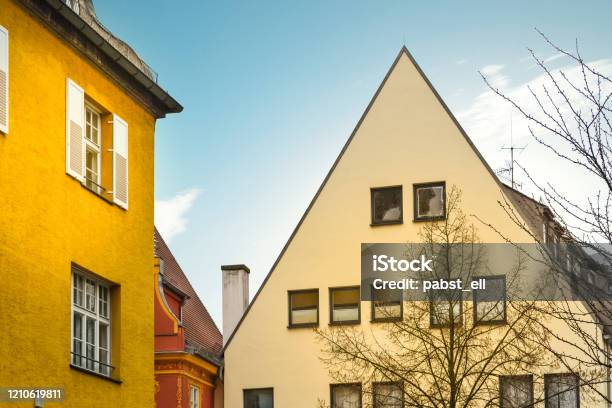 Ingolstadt Townhouses Looking Up To Blue Sky Golden Hour Stock Photo - Download Image Now