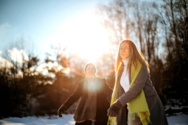 Couple in snowy forest having good time