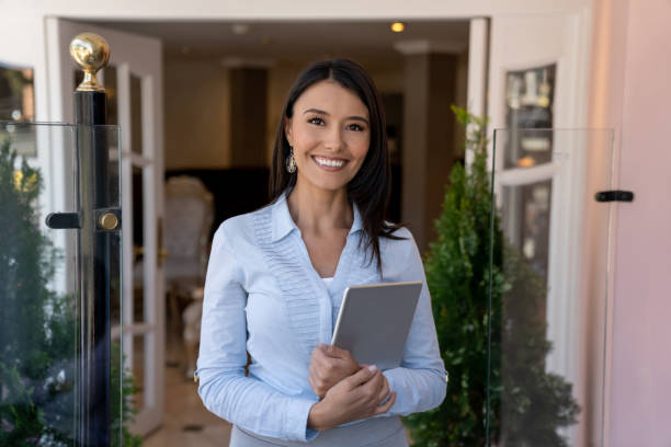 istock Happy business manager working at a hotel 1210630156