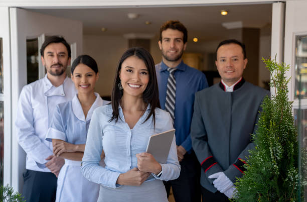 group of workers at a hotel - hotel occupation imagens e fotografias de stock