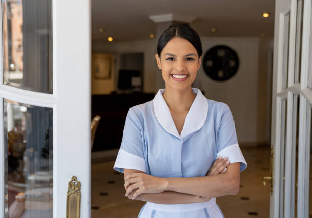 istock Friendly Latin American maid working at a hotel 1210630170