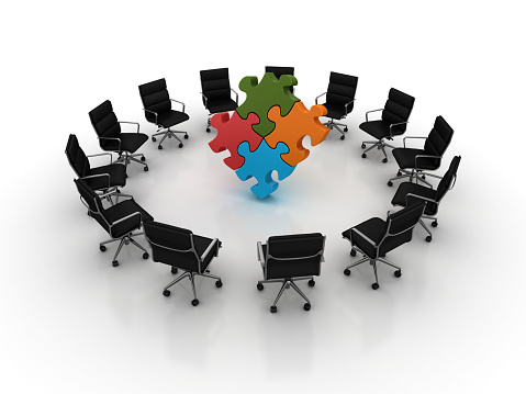 Chairs Teamwork with Jigsaw Puzzle - White Background - 3D Rendering