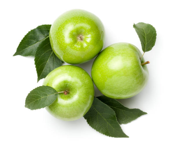 manzanas verdes aisladas sobre fondo blanco - apple granny smith apple green leaf fotografías e imágenes de stock