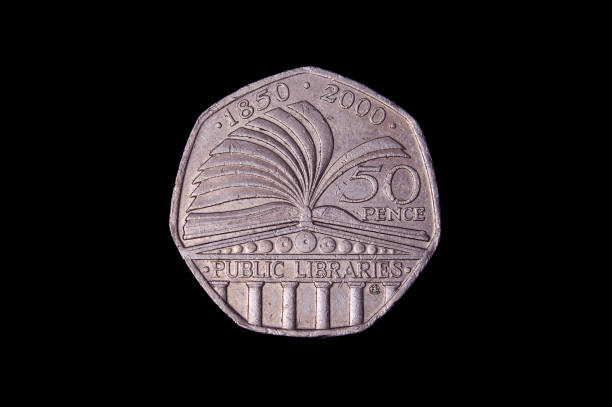 Commemorative 50 pence UK coin isolated on the black background