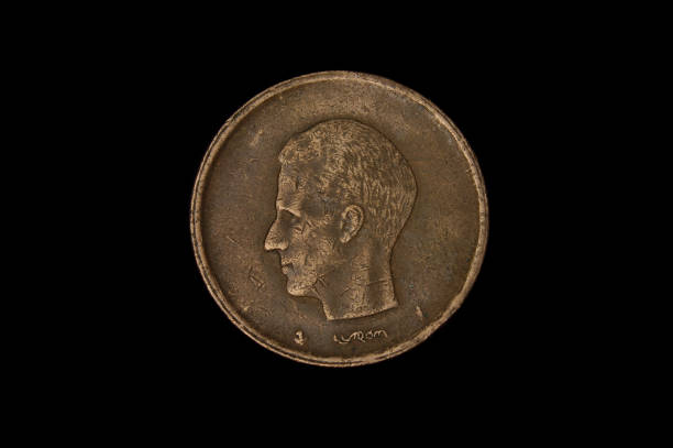 istock 20 Francs Belgium coin isolated on the black background 1210633224