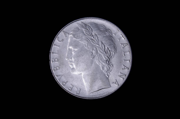 istock L.100 italian coin isolated on the black background 1210633233