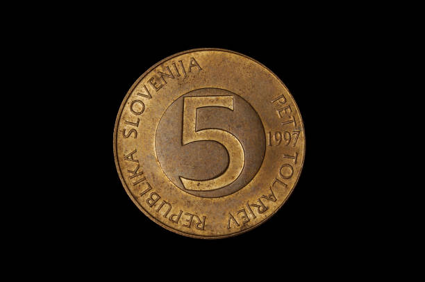 Five tolar Slovenian coin isolated on the black background