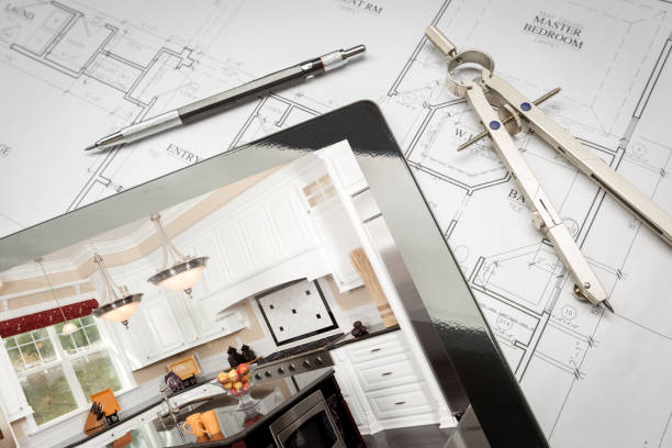 Computer Tablet Showing Kitchen Illustration On House Plans, Pencil, Compass Computer Tablet Showing Kitchen Illustration On House Plans, Pencil, Compass. home addition photos stock pictures, royalty-free photos & images