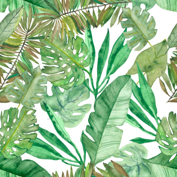istock Watercolor hand painted nature tropical seamless pattern with green different palm leaves on the white background, jungle print for design elements, textile and wallpapers 1210634878