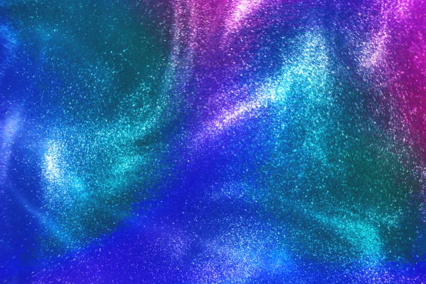 istock neon rainbow glitter shimmering magic bokeh background 1210638098