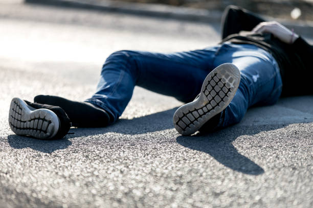 istock Caucasian white man hit by a car on a crosswalk 1210643344