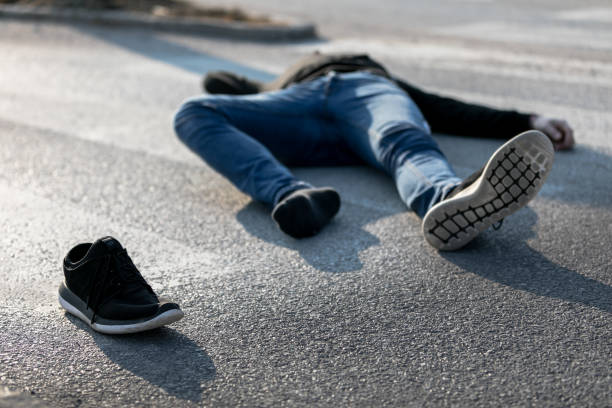 istock Caucasian white man hit by a car on a crosswalk 1210643625
