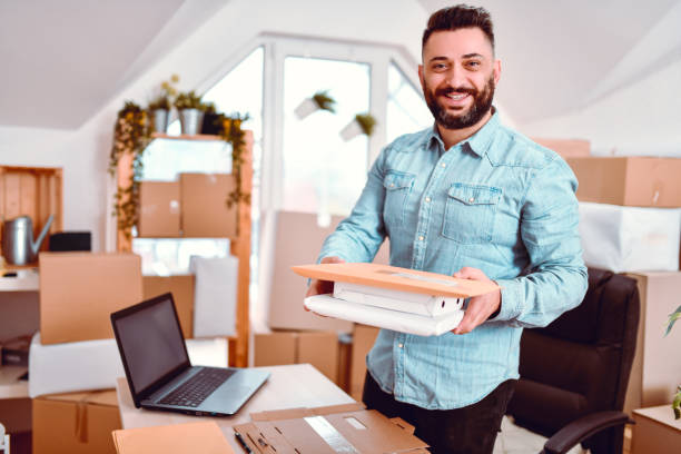 istock Handsome Male Manager Ready To Send Out Packages From Delivery Office 1210644694