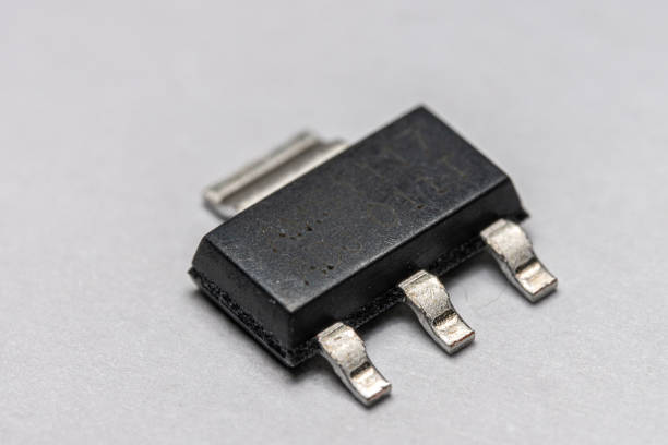 Row of electronic jfet on white background
