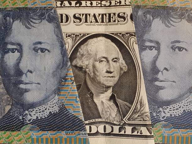 istock approach to American one dollar bill and Australian banknotes 1210645836