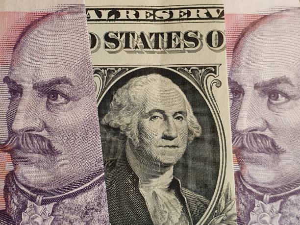 istock approach to American one dollar bill and Croatian banknotes 1210645883