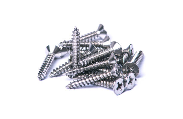 istock Screws on a white background. Macro photography. 1210650134