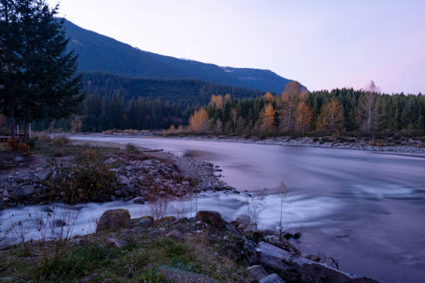 istock Long exposure of a flowing river, Mount Rainier 1210650959