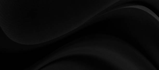 istock Black gray satin dark fabric texture luxurious shiny that is abstract silk cloth panorama background with patterns soft waves blur beautiful. 1210655785