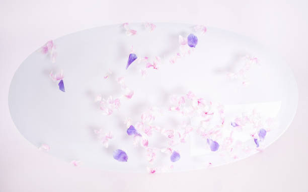 istock Flower petals in water. 1210659005