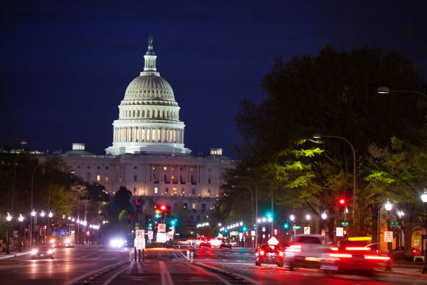 istock Pennsylvania Avenue traffic and US Capitol dome 1210659452