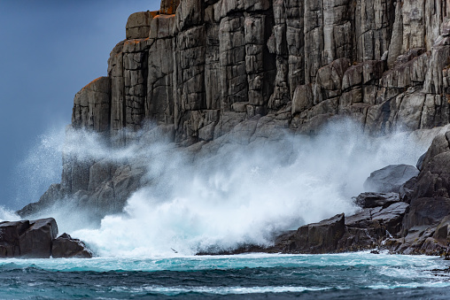 Blue ocean waves abstract background. Rough sea water during stormy weather. Surface of sea wave splash