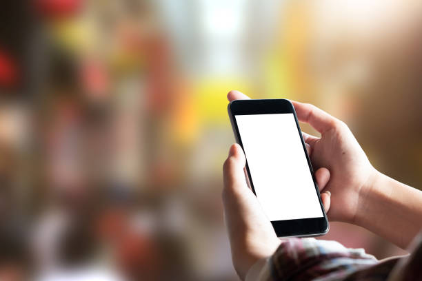 istock Close up Woman hand Using a Smart Phone with blur background. 1210669754