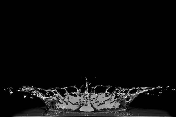 istock Liquid Water Droplet Collision Crown splash on black background. 3D Render 1210670834