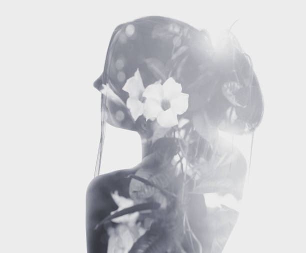 istock Multiple Exposure of woman and flowers 1210675700