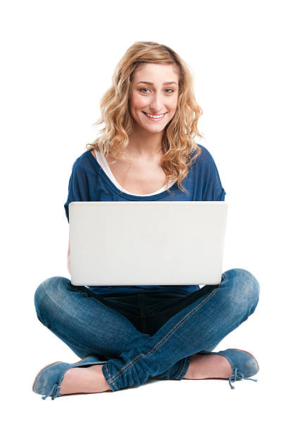 istock Smiling girl at laptop 121068459