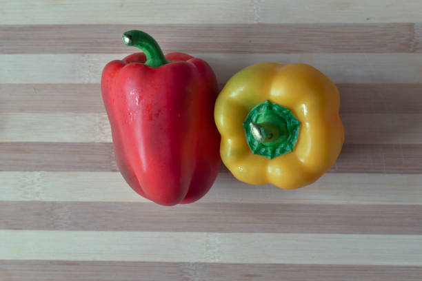istock Food photography : yellow and red bell capsicum 1210685829