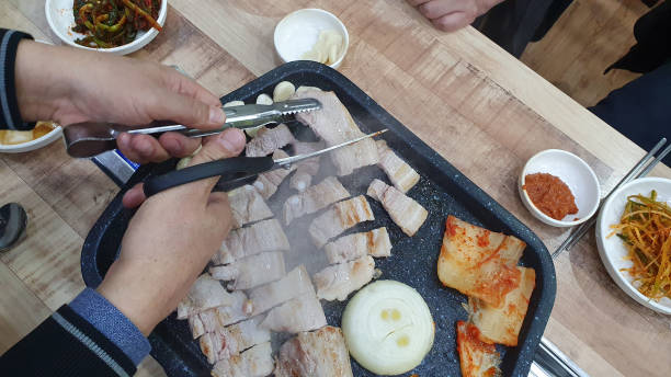Samgyeopsal, Roast pork belly over a hot grill stock photo
