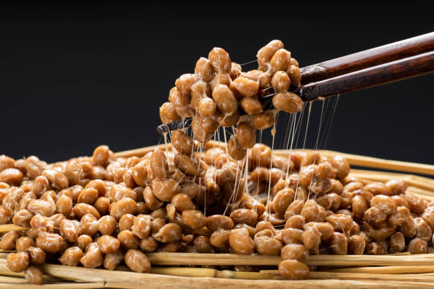 Natto, fermented soybeans, traditional healthy Japanese food. Natto, fermented soy, healthy traditional Japanese food. natto stock pictures, royalty-free photos & images