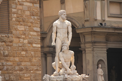 Fontana del Nettuno in front of Palazzo Re Enzo in old town Bologna, Italy.