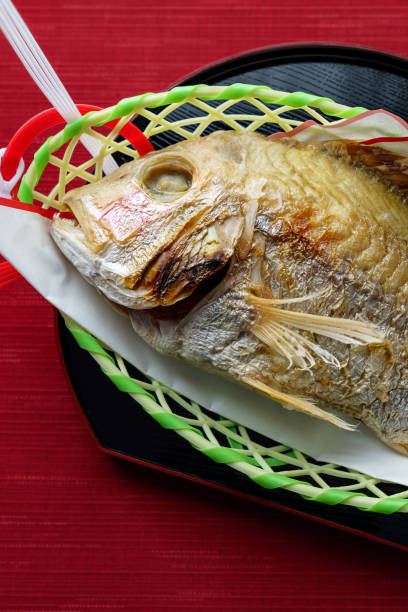 istock Whole grilled sea bream with salt 1210705806