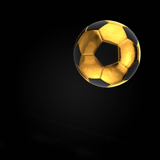 istock Gold soccer ball on dark background. 1210705918