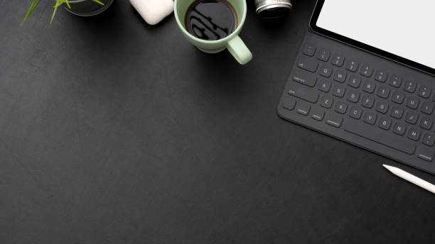 istock Top view of photographer workspace with wireless device, camera, coffee cup and copy space 1210707777