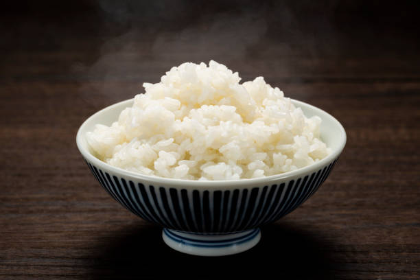 istock Freshly cooked hot rice, in bowl 1210708084
