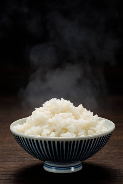 istock Freshly cooked hot rice, in bowl 1210708088