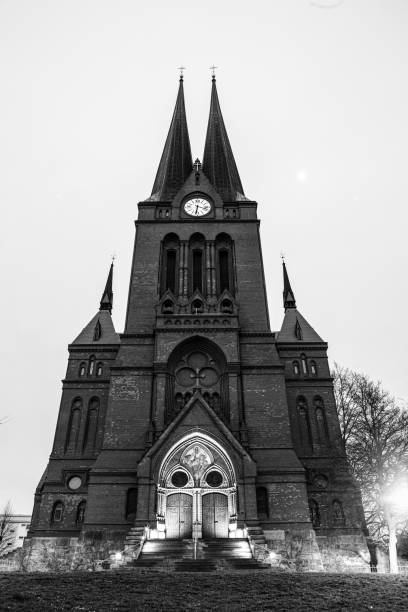 On Thursday March 5th 2020, the St. Mark's Church at the start of the evening. This is a Lutheran Protestant Church built in 1895 and have had renovation works in 1935 and 1989. Is is also today a venue for important cultural events. Its bells and organ are famous in the community. This is a high contrast in a monochromatic image for a more dramatic feeling.