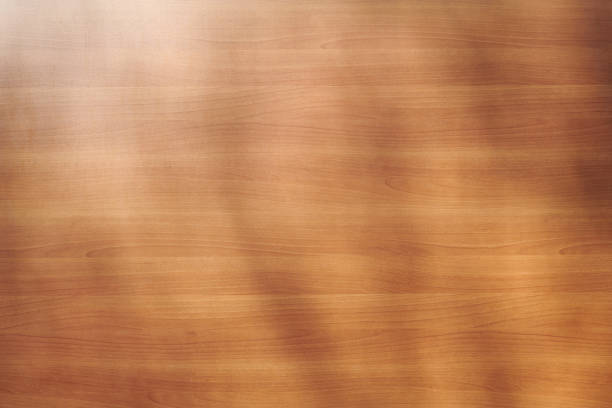 High resolution photograph of a modern wooden shielding of an office building, the soft reflection of the sun in the left corner.