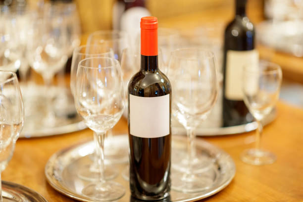 istock Wine bottle with glasses on the tray 1210712192